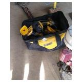 Dewalt tool bag full of Dewalt power tools,