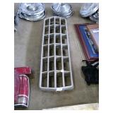 Automobile grill.  Ford? 
(Grill only)