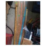 Group of yard sticks and plate rail