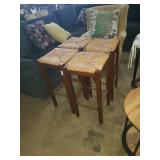 Group of wicker bar stools