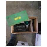 Group with car radios, tools and spray paint