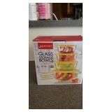 GLASS BOWL STORAGE SET. FOUR BOWLS WITH LIDS. One