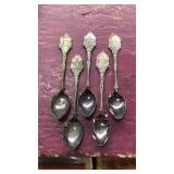 5 souvenir spoons. All marked Made in Holland. 1