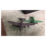 2 metal plane toys. Green marked USA. Silver