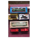 6 train cars. 2 Bachmann in boxes