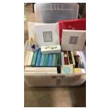 Large tote with lid full of Avon. Mostly