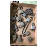 Flat of assorted locks most with keys