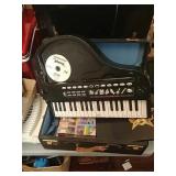 Vintage brief case with a baby grand piano (works