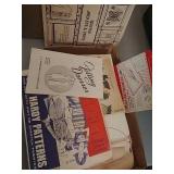 Flat of vintage sewing patterns & such