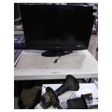 Insignia 33in tv. No remote, unsure of condition.