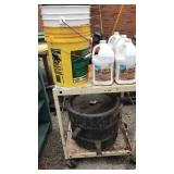 Cart on wheels with oil pans, deck wash and