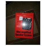 Realistic mini amplified speaker