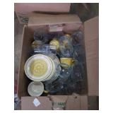 Set of yellow dishes marked USA and glasses and
