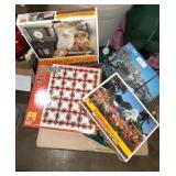 4 unopened Jigsaw Puzzles