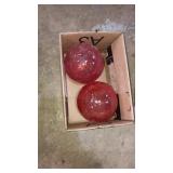2 red glass balls approx 5 inch diameter