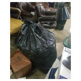 Large trash bag of towels and bonus