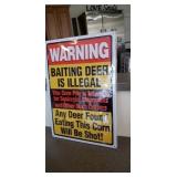 Warning baiting deer is illegal this corn pile is