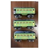 3 green Lionel train cars. 2 Pullman 607, one