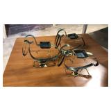 3 metal pelican tealight holders. Each is  8.5