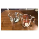2 measuring cups. Pyrex red 2 cups, Martha