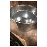 2 galvanized bucked with some glass pans