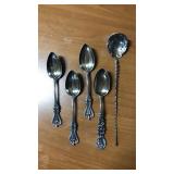 5 piece sterling. 3 spoons match, 1 spoon is