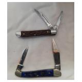2 Small 3" Pocket Knives marked. Blue one Frost