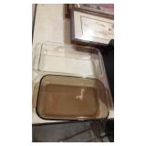 2 Pyrex baking dishes. Clear 232 & brown 232R