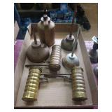 Group of 7 oil can finger pumps. 3 marked eagle