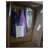 Pair of water bottles and phone
