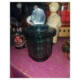Green heavy glass dish with lid. Measures about