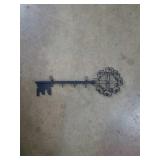 Metal key holder. Measures about 13in wide
