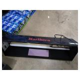 Hanging Marlboro light.
Approx. size 41x13 1/2.