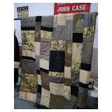 Modern quilt made to look like hand stitching.