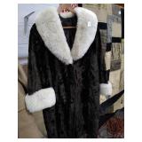 Pair of ladies coats.   One is brown faux fur,