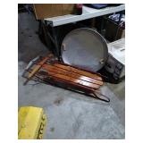 Sledding group.    A red Flexible Flyer sled and