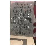 Sign presses wood