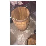 Wooden barrel about 3 ft tall with yard