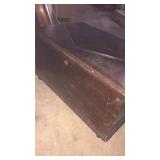 Wooden chest 26 " wide 15" tall on wheels