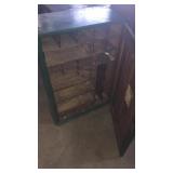 Antique cabinet with lots of drawers and spaces
