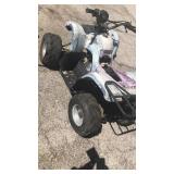 4 wheeler thing, flat tires, no seat no name