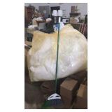 Bag of packing foam like huge bag look at broom