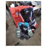 Group of Life vests.
2 vests are Adult size.
