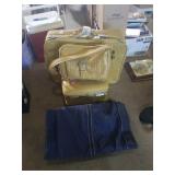 Group of vintage yellow luggage