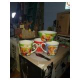 Group of Kellogg mugs and bowl