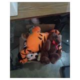 Group of stuffed animals tiger and mickey