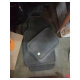 Group of grey floor mats