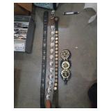 Group of 3 leather belts and wall plaque