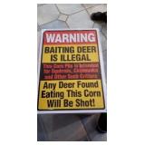 WARNING BAITING DEER IS ILLEGAL. THIS CORN PILE