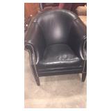 Black buttoned chair